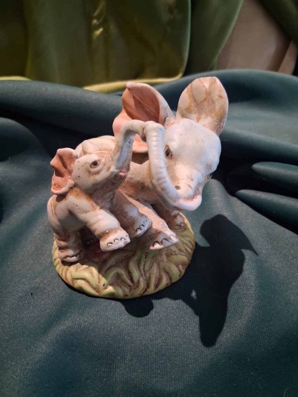 Charming vintage matte bisque ceramic figurine depicting an Mom & baby elephants